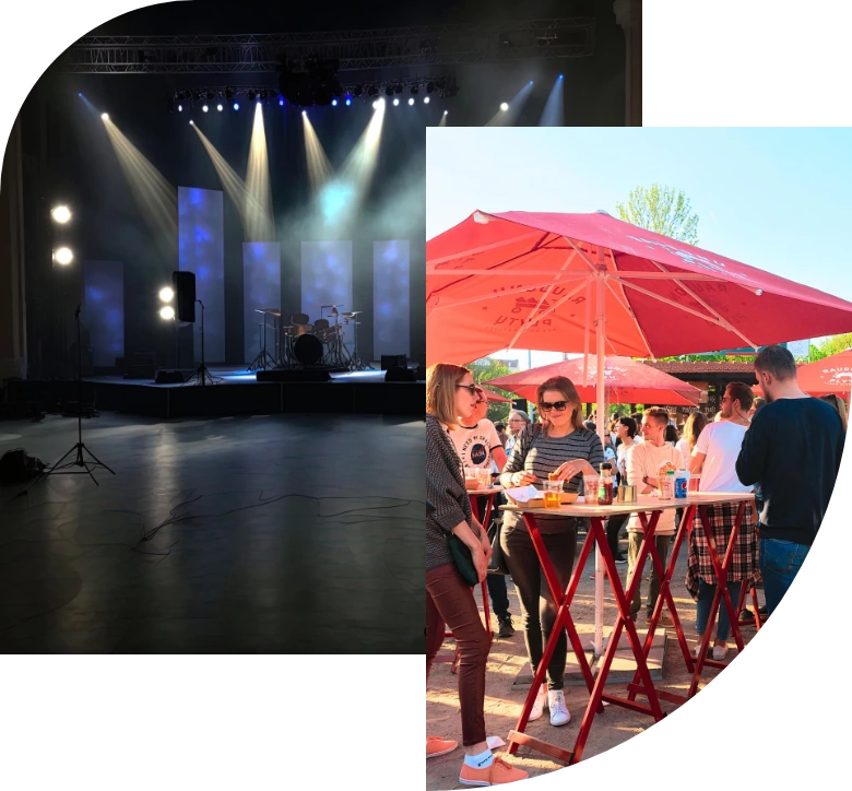 escenario concierto montado y mesas con gente comiendo